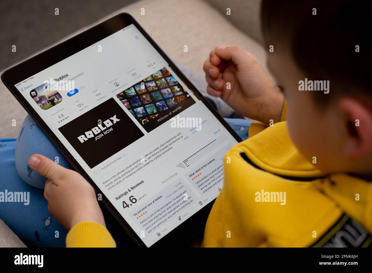 ROBLOX app seen on the screen of ipad which is in the hands of  unrecognisable child. Concept. Stafford, United Kingdom, May 18, 2021 Stock  Photo - Alamy