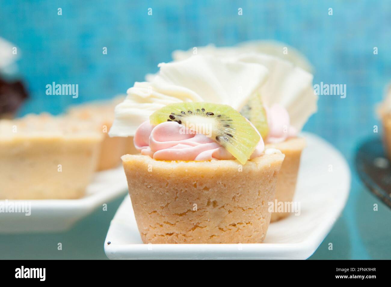 Closeup shot of muffins decorated with kiwi Stock Photo - Alamy Closeup shot of muffins decorated with kiwi Stock Photo - Alamy