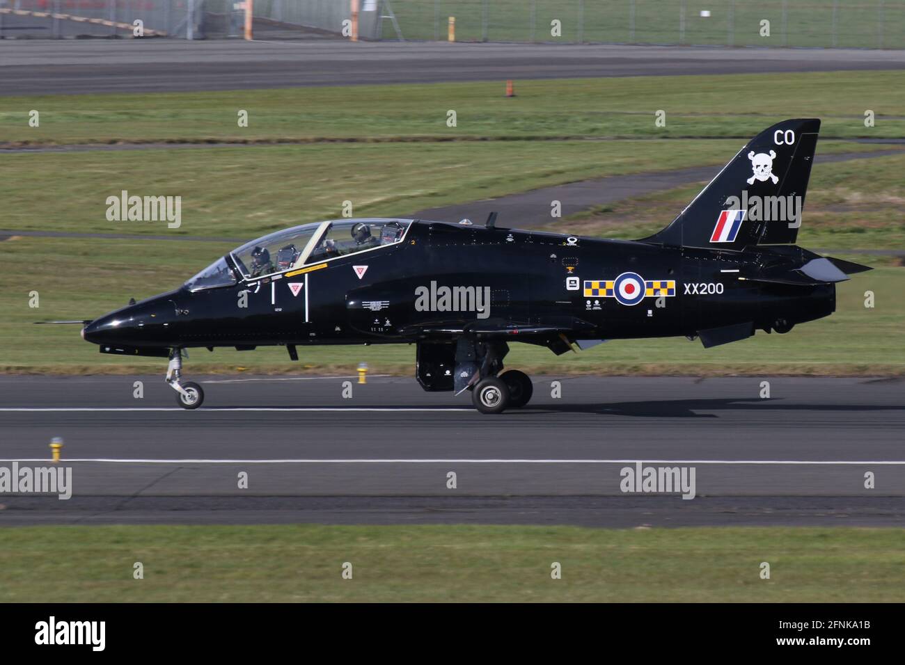 XX200, a BAe Hawk T1A in the colours of 100 Squadron, Royal Air Force, arriving at Prestwick Airport, Ayrshire in preparation for its participation in Exercise Joint Warrior 21-1. Stock Photo