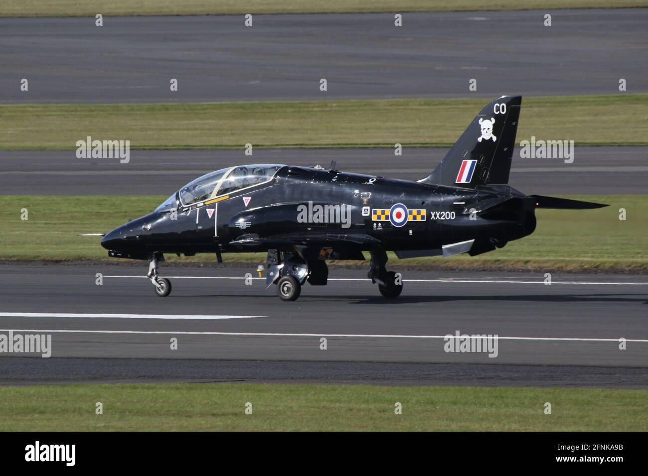 XX200, a BAe Hawk T1A in the colours of 100 Squadron, Royal Air Force, arriving at Prestwick Airport, Ayrshire in preparation for its participation in Exercise Joint Warrior 21-1. Stock Photo