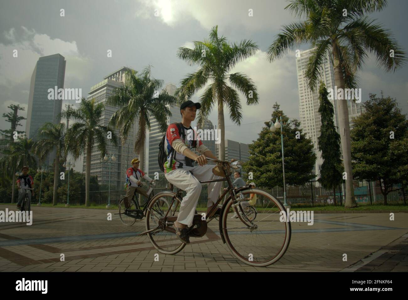 Cycling enthusiasts touring on old bikes in Gelora Bung Karno (Senayan
