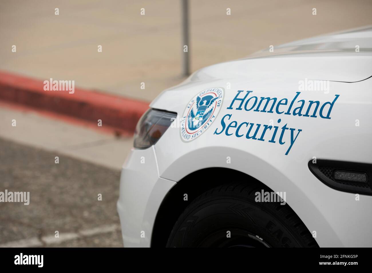 Los Angeles, California, USA - May 15, 2021: A Department of Homeland Security cruiser protects a Federal building. Stock Photo