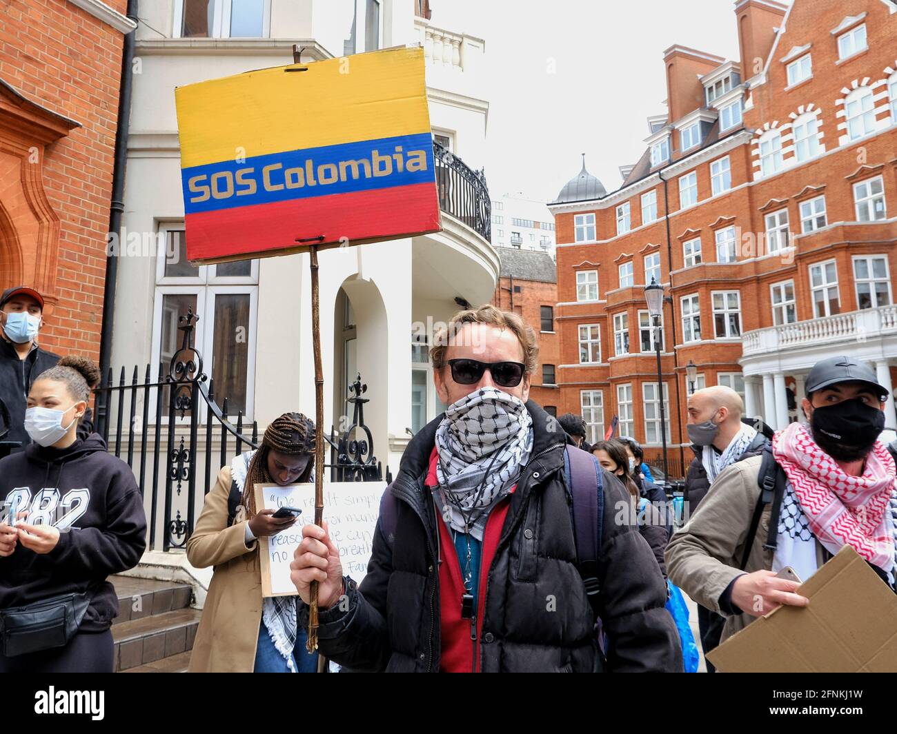 London, UK. 15/05/21 A protest takes place outside the Colombian embassy after the killings of civilians by police who protested against tax reform Stock Photo