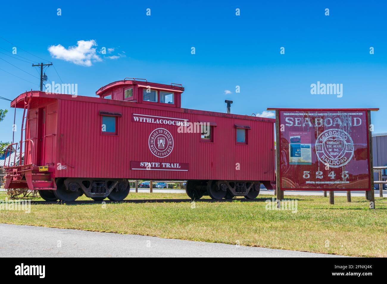 Caboose No. 5245 at the Apoka Avenue trail head of the Withlacoochee State Trail, a paved rail trail - Inverness, Florida, USA Stock Photo