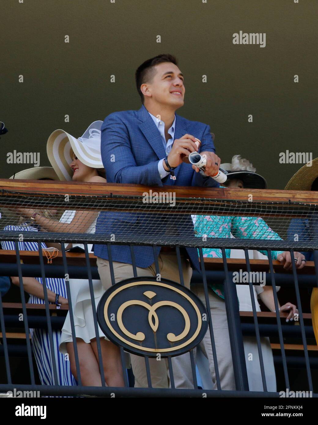 Patron in the Mansion watches the Thoroughbred racing at Churchill Downs May 1, 2021 Stock Photo