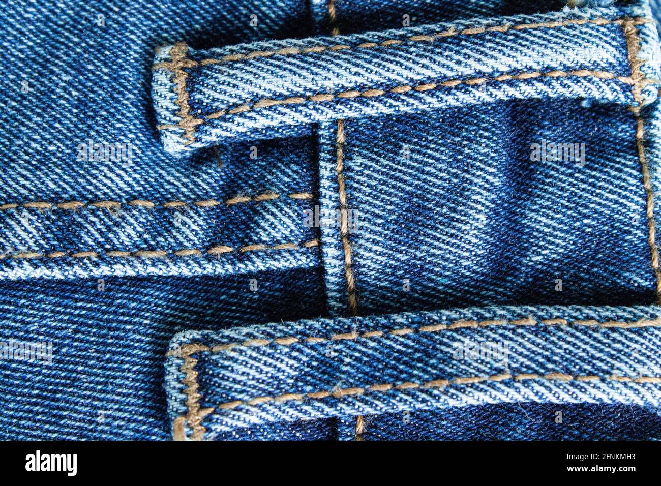 Blue jeans close up. Light blue thick fabric for trousers. Stock Photo