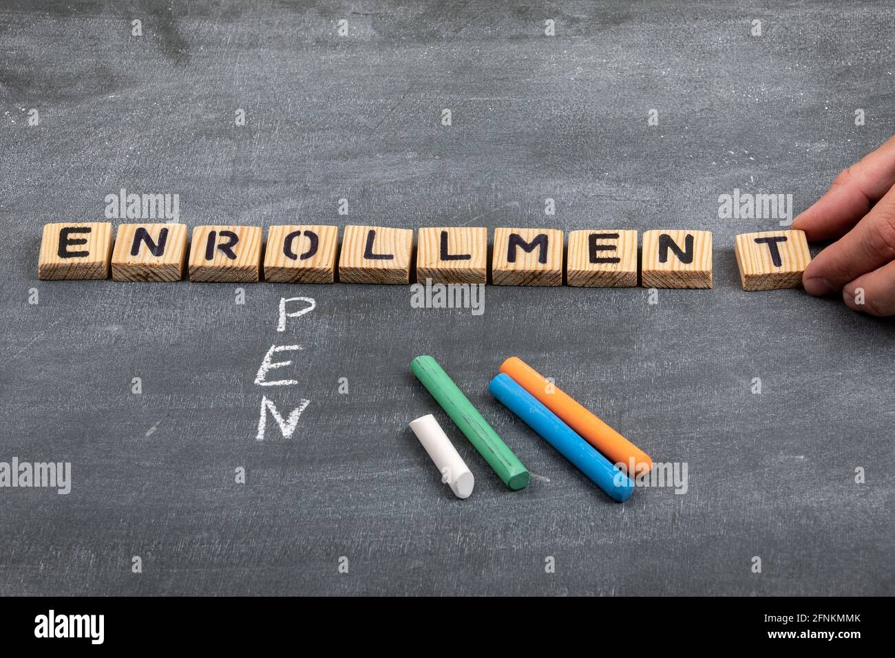 Open enrollment concept. Letters of the alphabet and colored pieces of ...