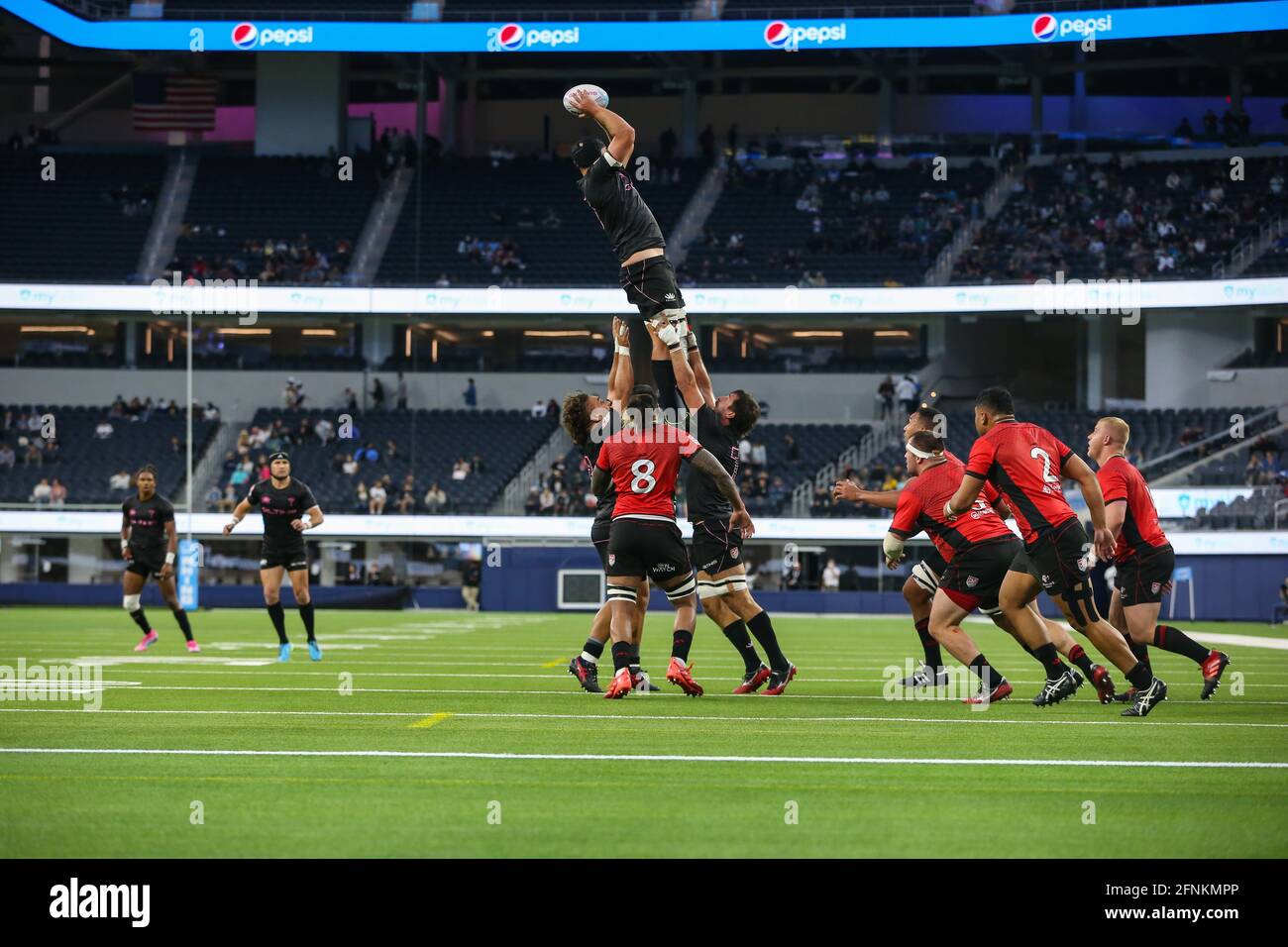 LA Giltinis Corey Thomas leaps for a pass during the Major League Rugby