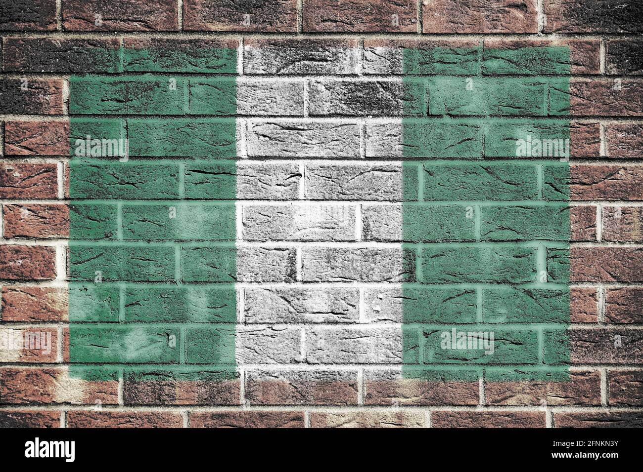 Nigeria flag on old brick wall background Stock Photo