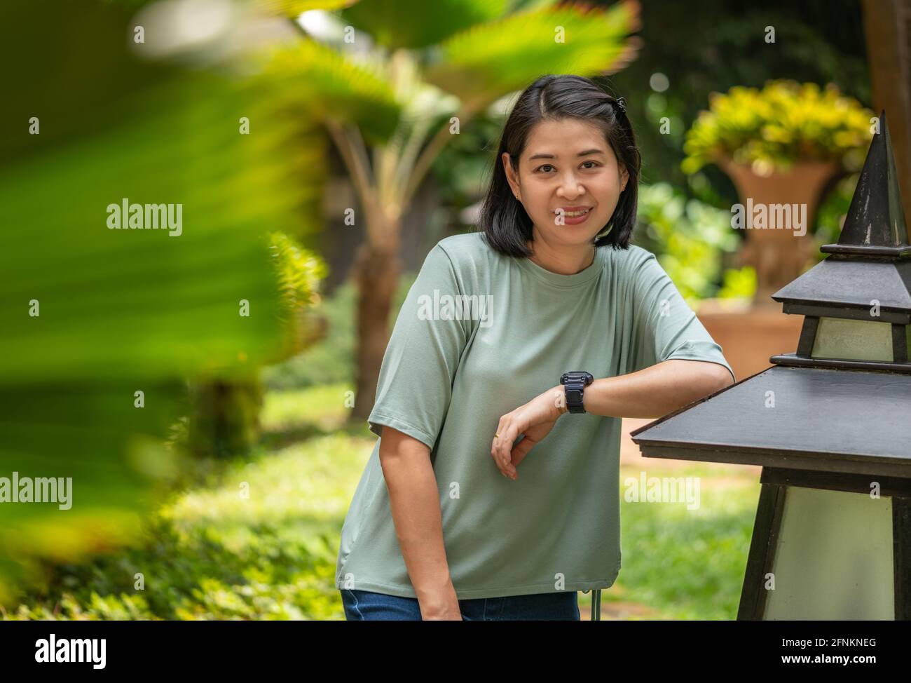 Portrait middle aged asian woman hi-res stock photography and images ...
