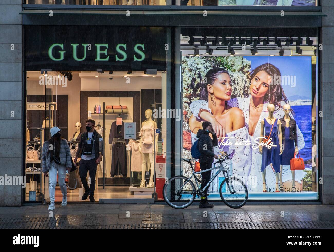 UK. 17th May, 2021. Shoppers coming out Guess fashion shop. The Prime announced that England can proceed to Three on May 17, 2021. Most shops can reopen including indoor. (