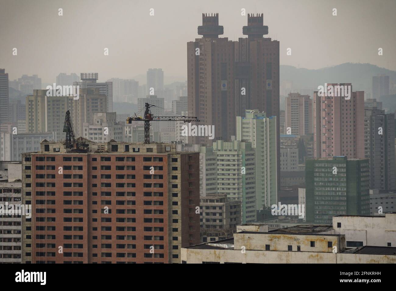 09.08.2012, Pyongyang, North Korea, Asia - Cityscape with residential high-rise buildings in the city centre of the North Korean capital. Stock Photo