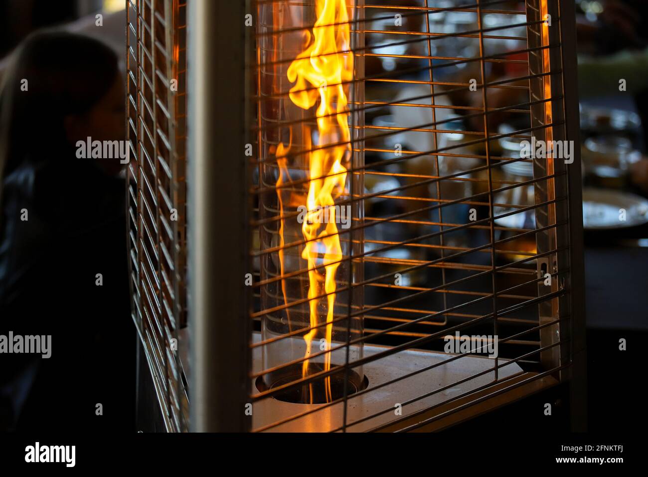 A closeup selective focus shot of an outdoor heater.  Stock Photo
