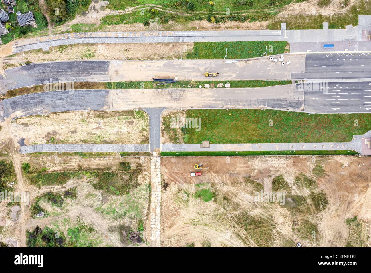 aerial top view of road construction site in city suburb Stock Photo