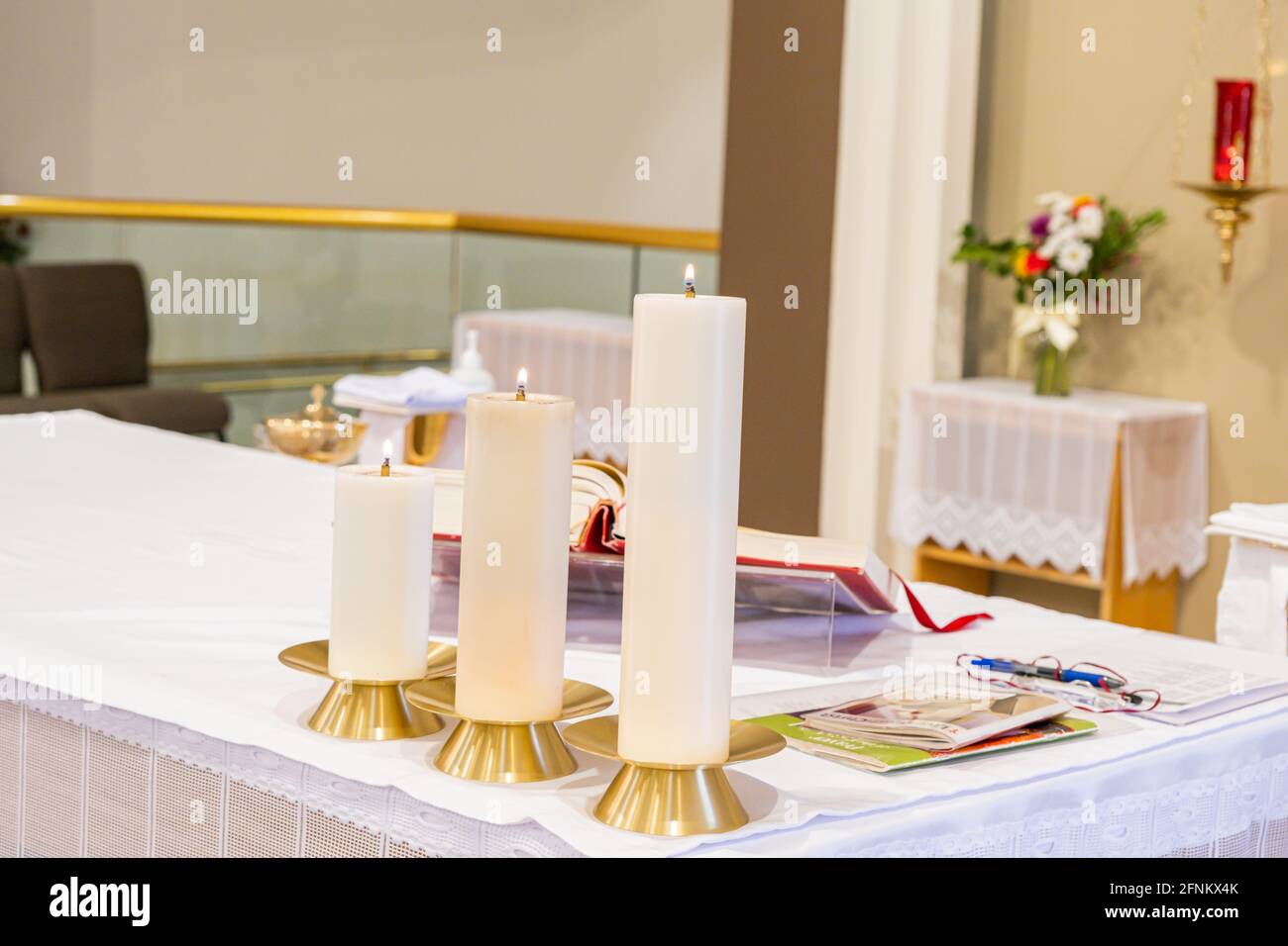 Baptism candles on church Altar during baptism Service Stock Photo Alamy
