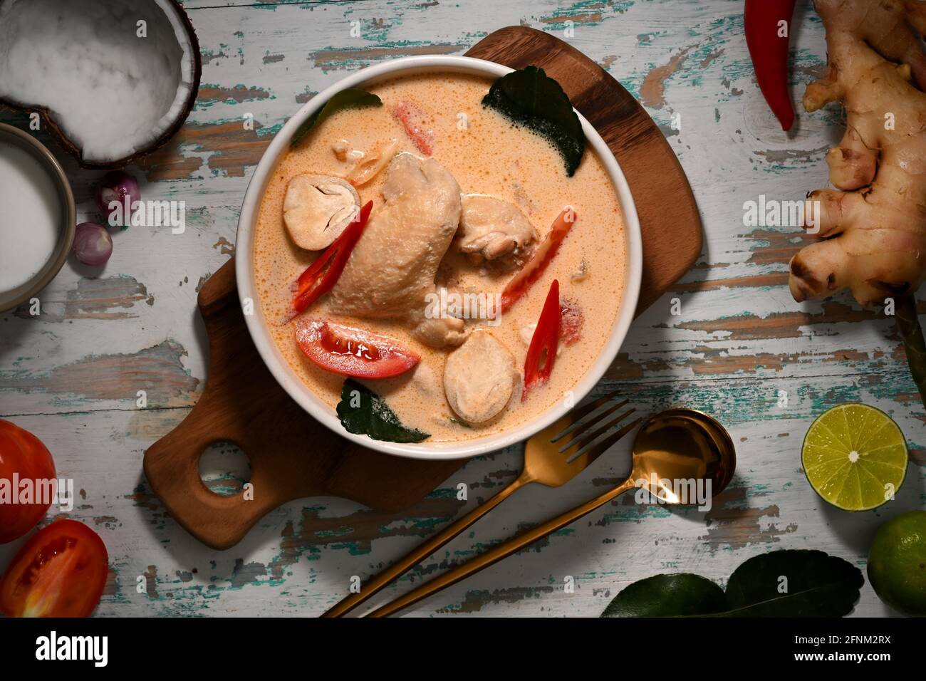 Top View Of Tom Kha Gai Coconut Milk Soup With Chicken Thai Food On top-view-of-tom-kha-gai-coconut-milk-soup-with-chicken-thai-food-on