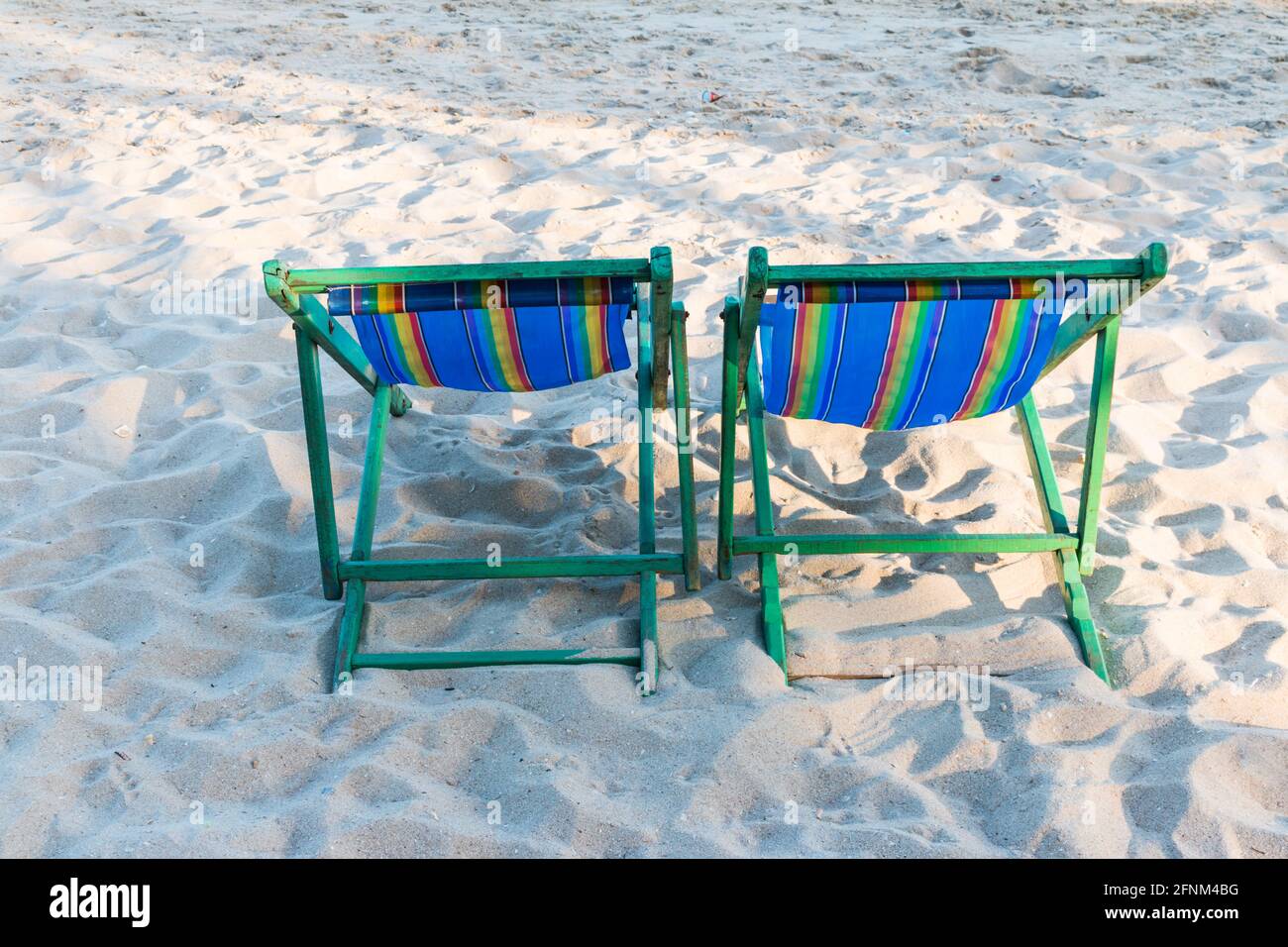 wooden beach chair at the beach background Stock Photo - Alamy