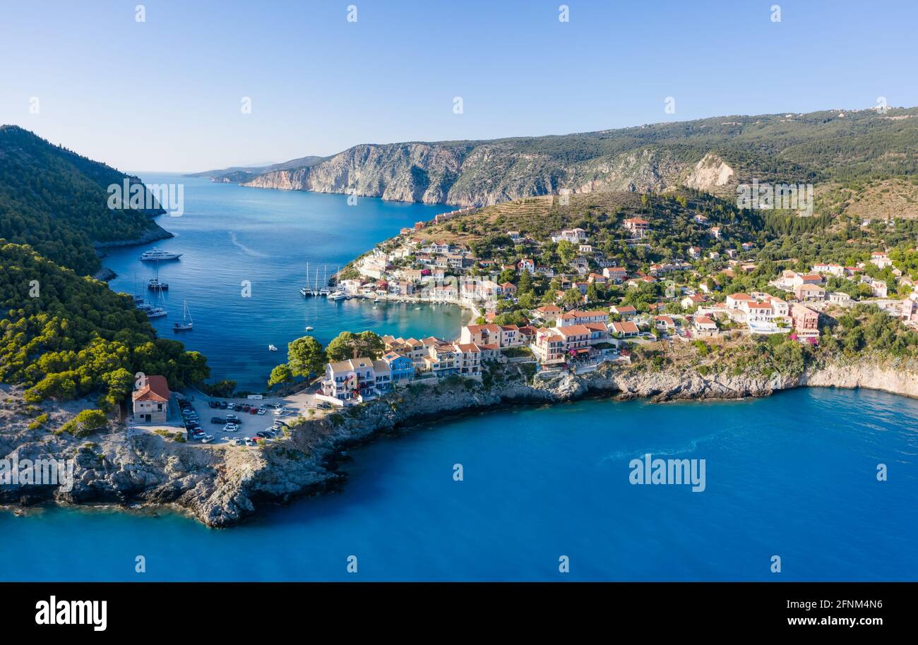 Assos in island of Cefalonia, Ionian, Greece. Aerial drone photo of beautiful and picturesque colorful traditional fishig village Stock Photo