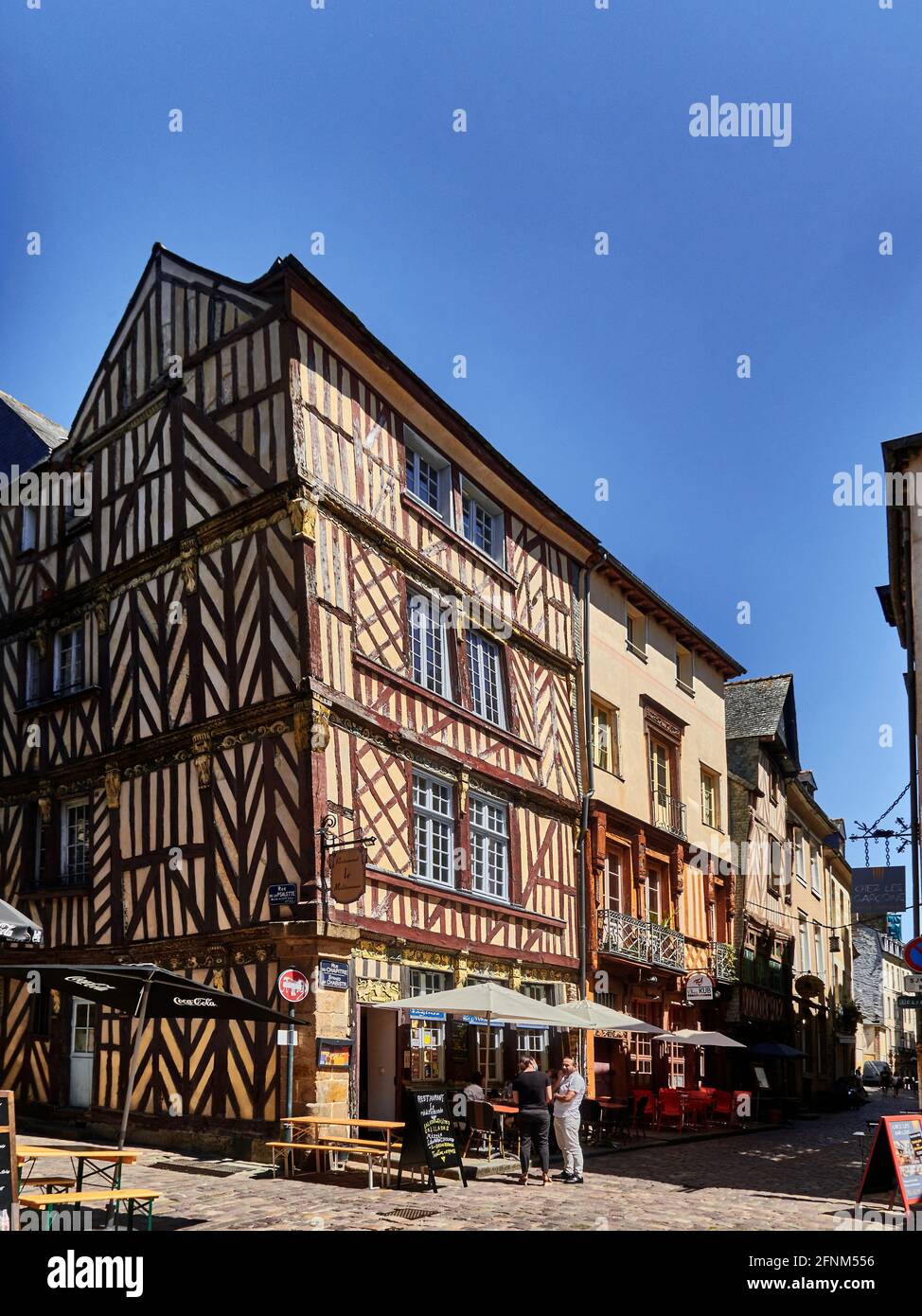 France. Rennes; city; Ille-et-Vilaine department, Brittany. In chapter street, tables are set in the pedestrian street for a drink or a meal. Tourists Stock Photo