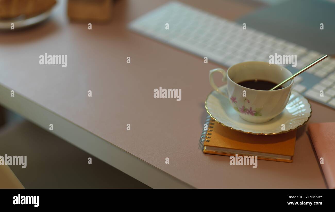 Cup Using Computer Close up view of coffee cup on computer table with copy space and ...