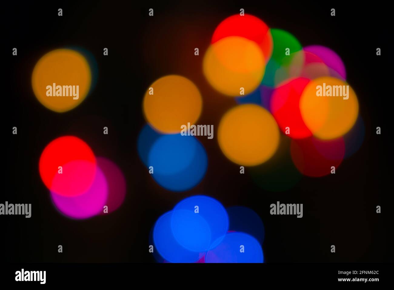 Colorful circles of light abstract bokeh background Stock Photo - Alamy