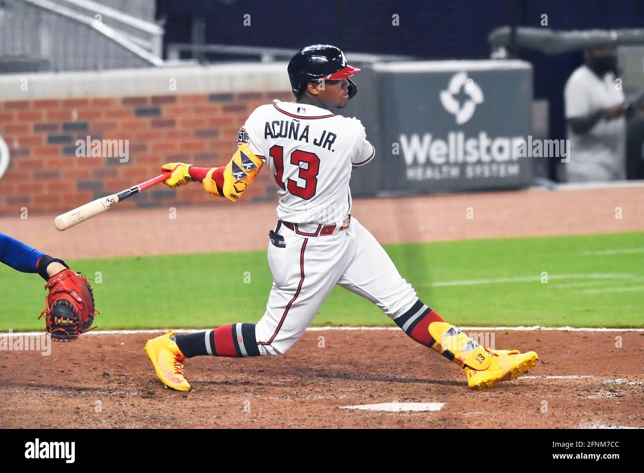 April 29, 2021: Atlanta Braves outfielder Ronald Acuna Jr. runs to first  base after hitting a single during the seventh inning of a MLB game against  the Chicago Cubs at Truist Park