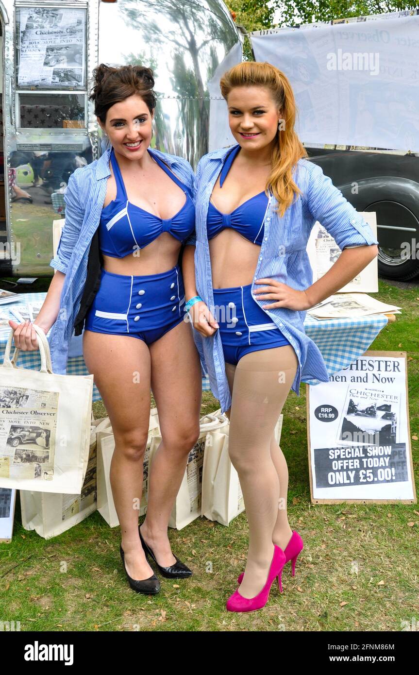 Girls at the Goodwood Revival 2010 in skimpy period costume Stock Photo
