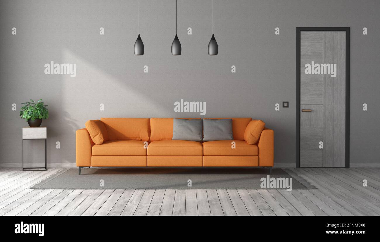 Modern living room with orange sofa in a gray room with closed door ...