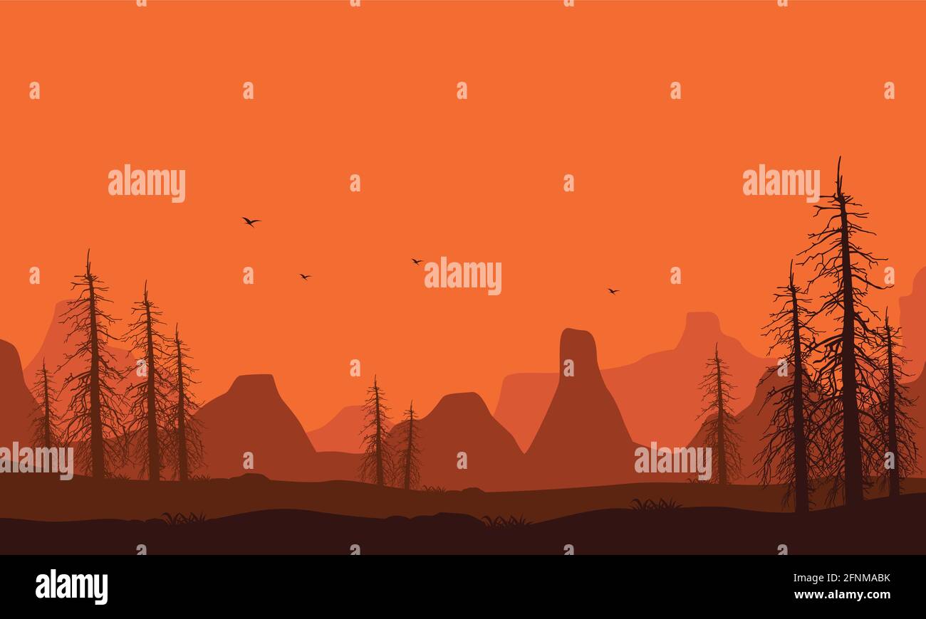 Mountain view with aesthetic silhouettes of dry trees from the suburbs ...
