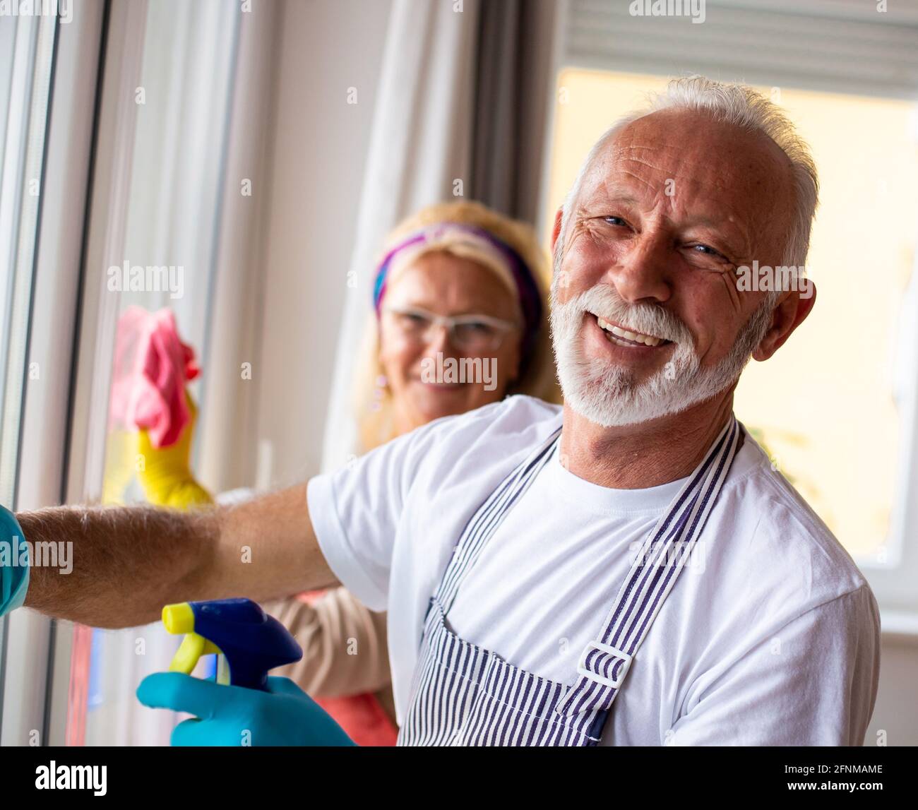 Elderly couple home cleaning hi-res stock photography and images - Alamy
