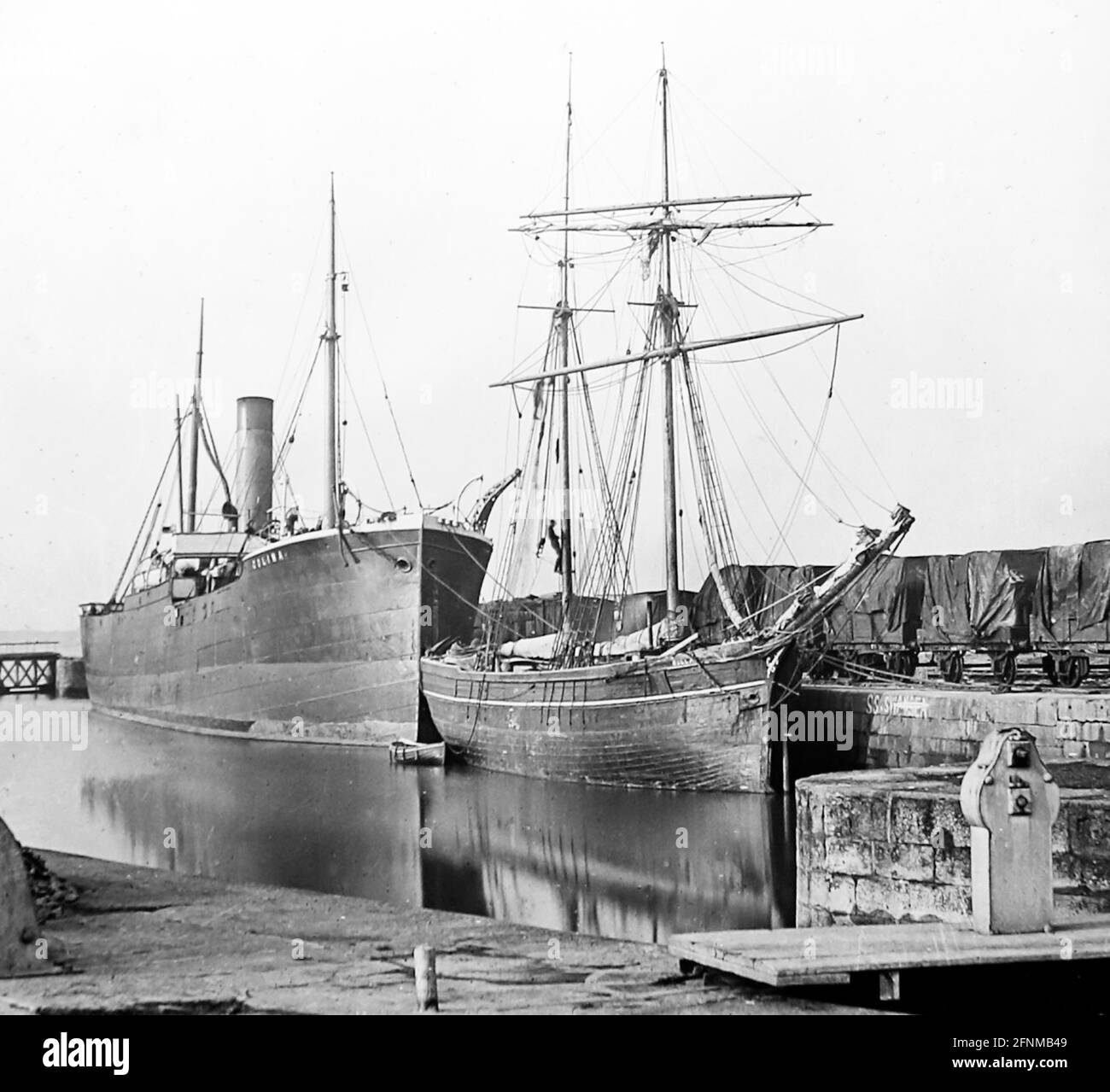 Glasson Dock near Lancaster (SS Colina and sailing boat Bulla), Victorian period Stock Photo
