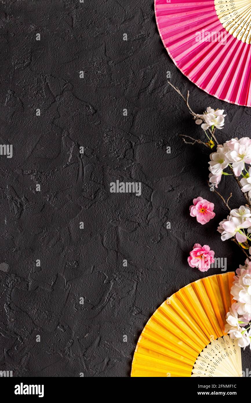 Asian background with hand fans and blossom branches Stock Photo - Alamy