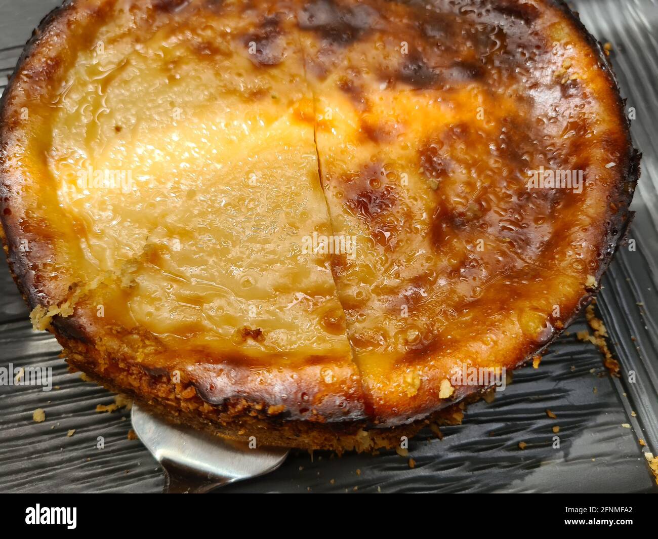 Whole apple kuchen cake in fall setting. Stock Photo