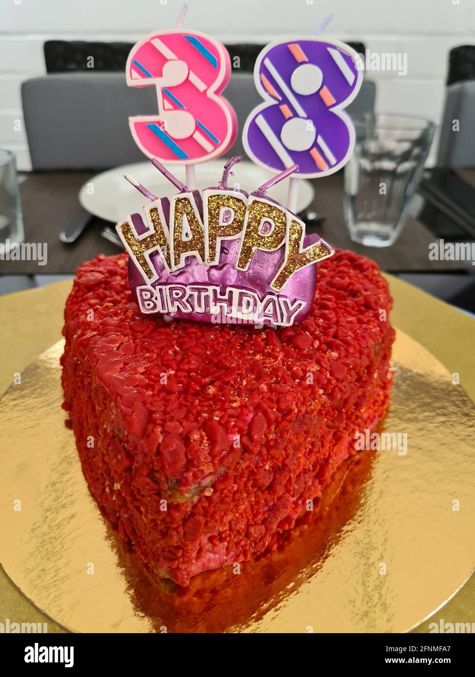 Heart shaped cake with candles hi-res stock photography and images - Alamy