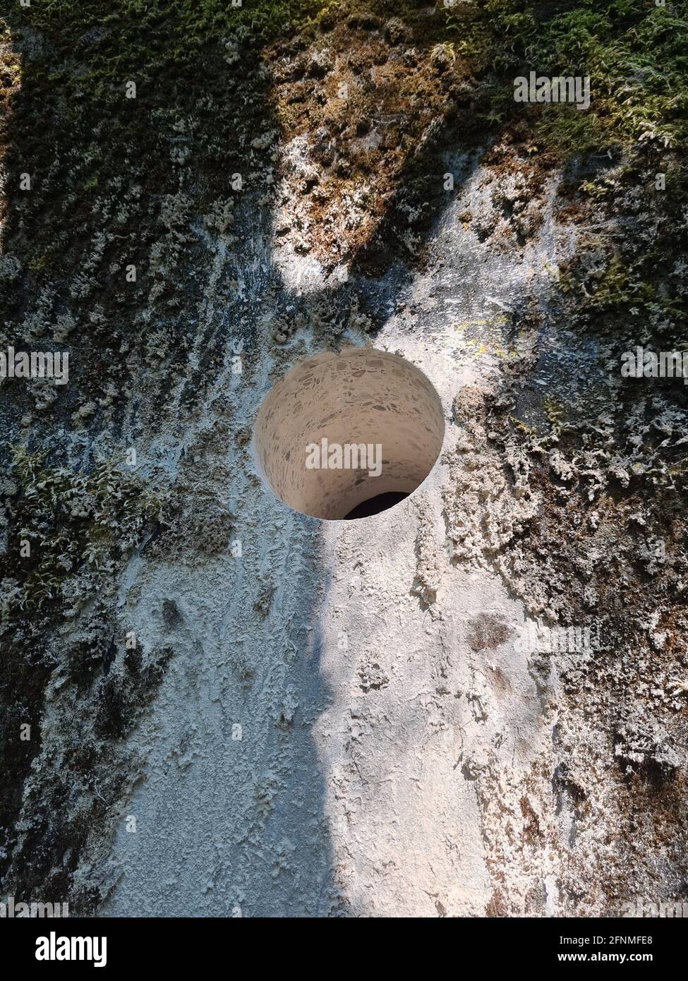 Finished core drilling through a concrete wall in the basement Stock Photo Alamy