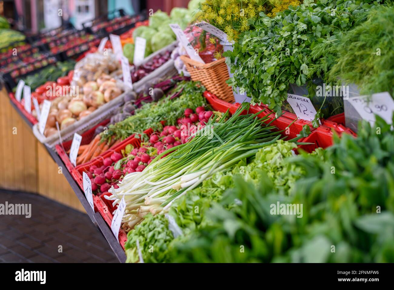 Fresh farmer vegetables and greens on market stall Stock Photo - Alamy