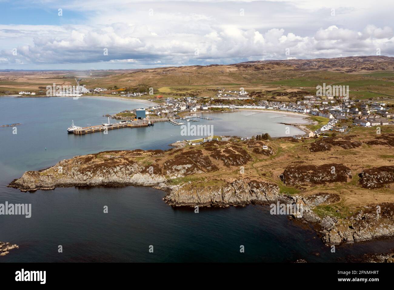 Aerial view of houses overlooking Leodamais Bay in Islay village of