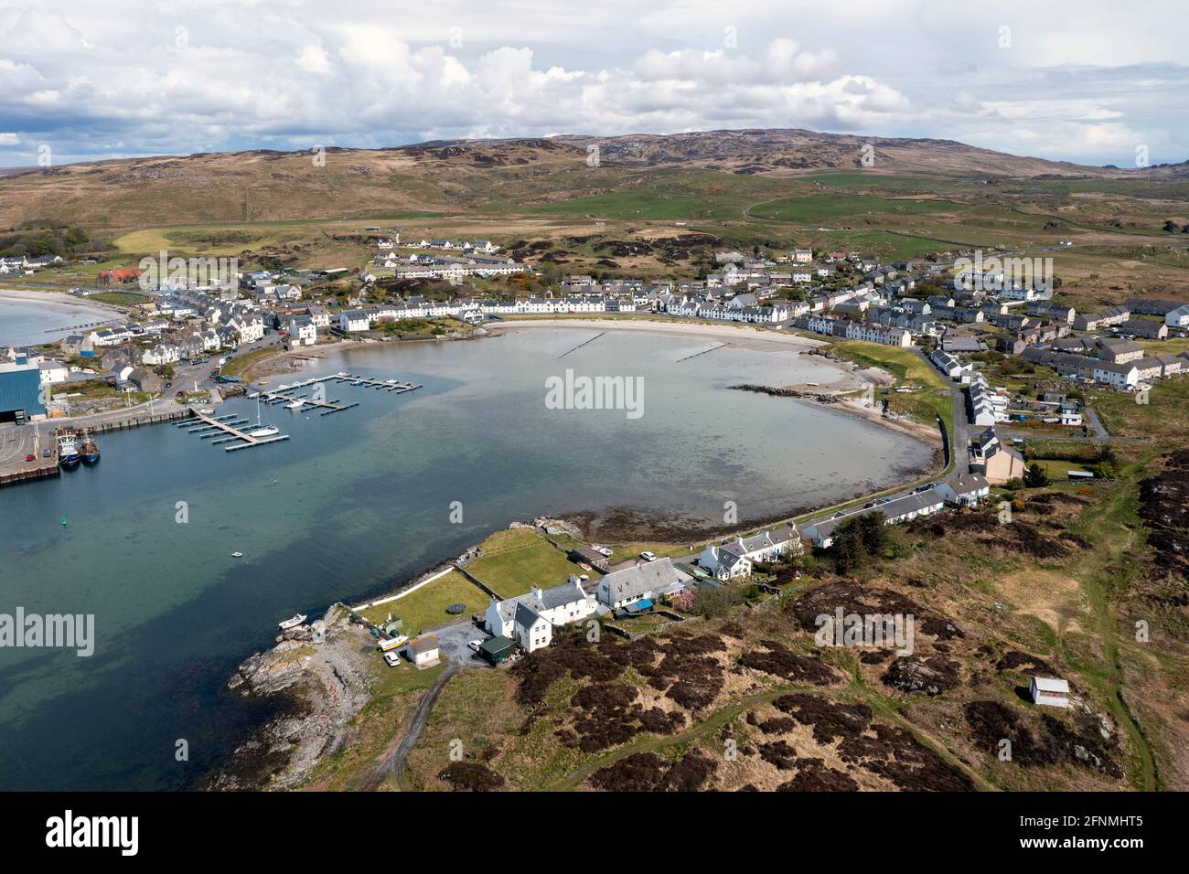 Aerial view of houses overlooking Leodamais Bay in Islay village of