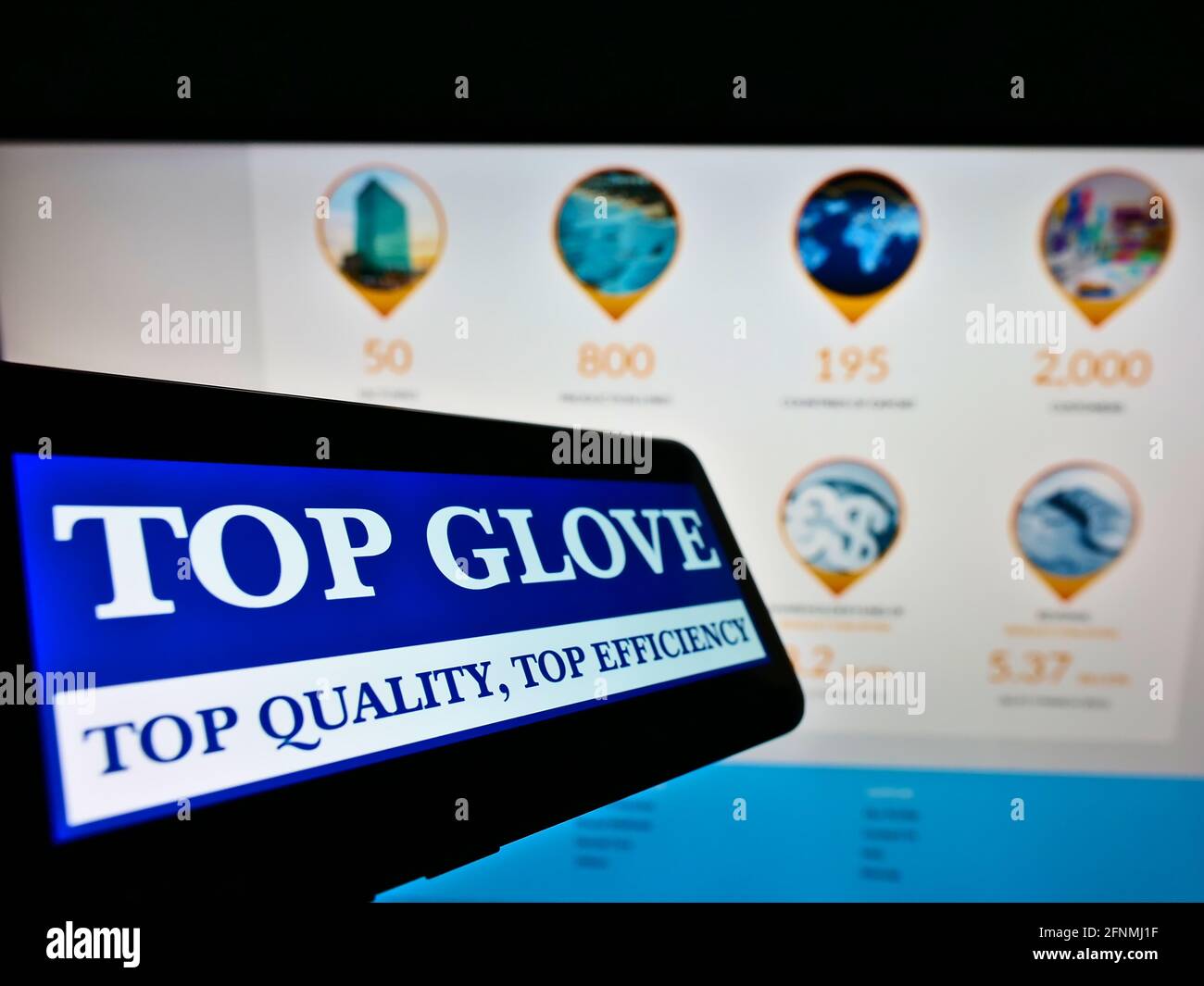 Mobile phone with logo of Malaysian company Top Glove Corporation