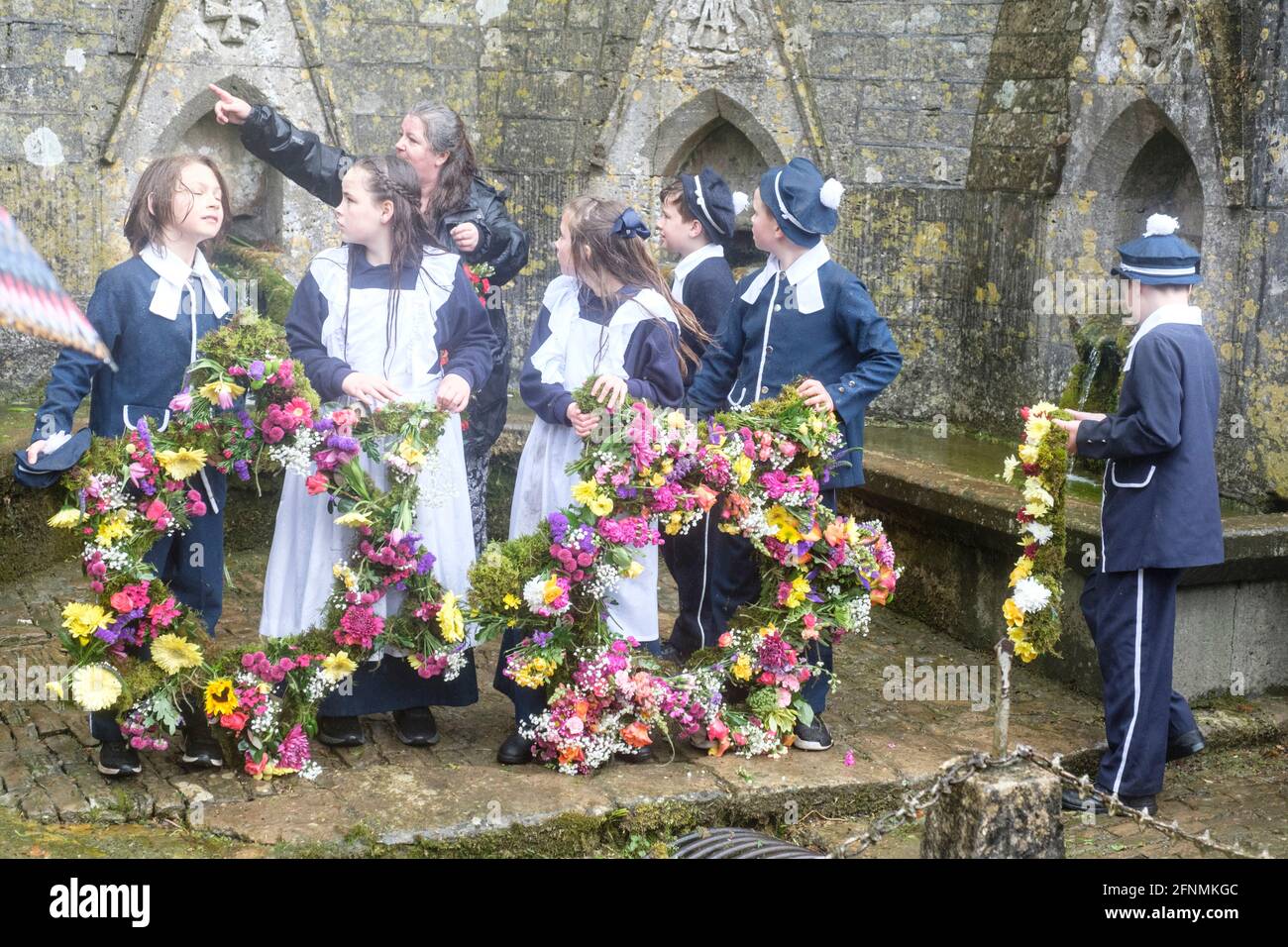 Dressing the Wells. a traditional Cotswold activity in Bisley. Children
