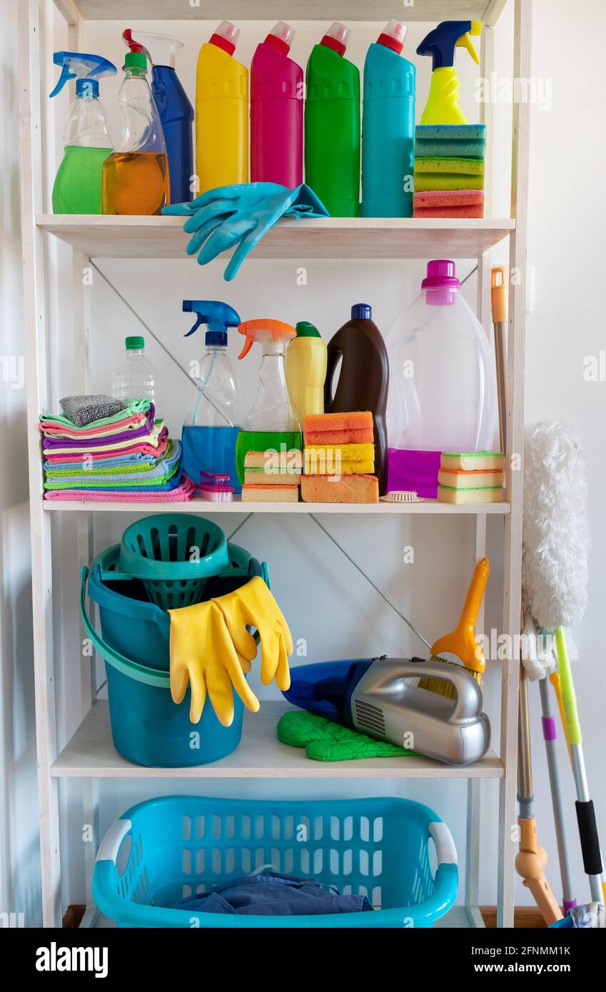 Shelves with cleaning products and tools in pantry Stock Photo Alamy