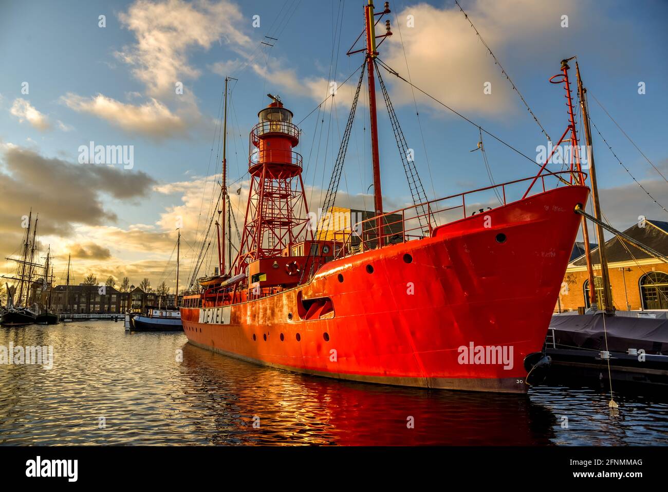 Den Helder, the Netherlands. The boats and warehouses of the former shipyard Willems in Den Helder, the Netherlands. High quality photo. Industrial heritage. Stock Photo