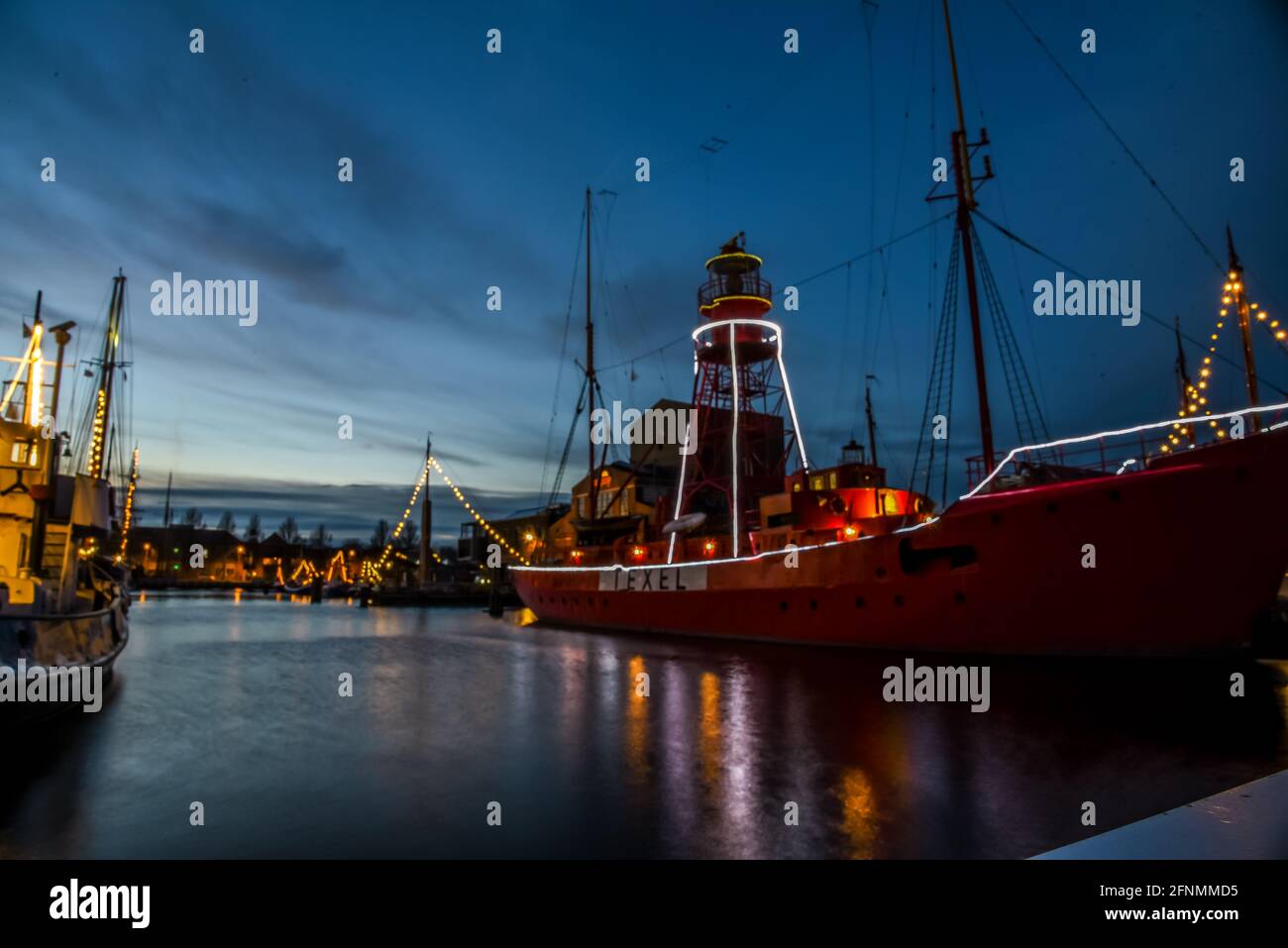 Den Helder, The Netherlands - December 18, 2020. The harbour of Den helder near the old shipyard 'Willemsoord', at dusk. Stock Photo