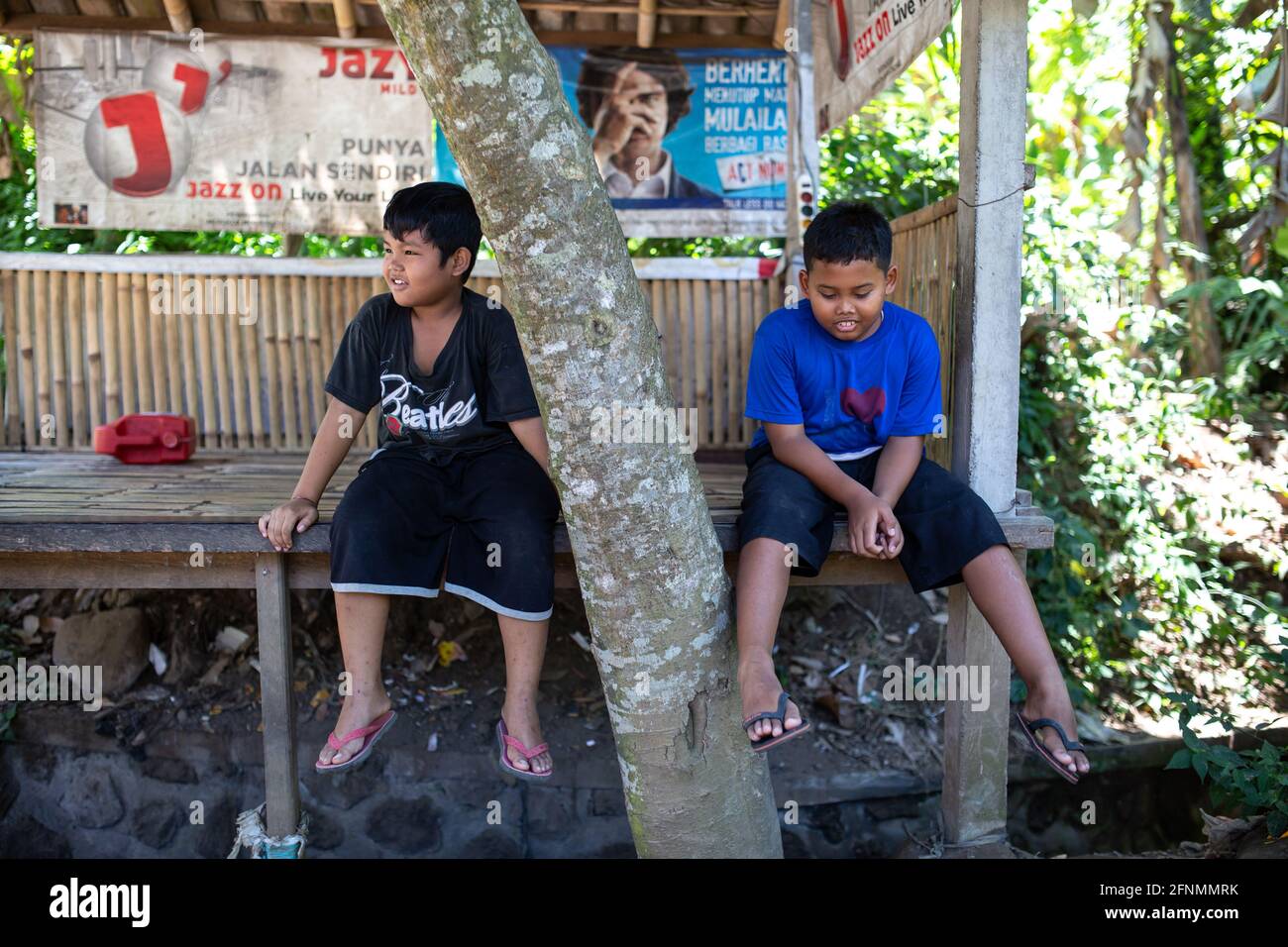 Bali, Indonesia - September 4, 2016: Children hanging out in the village. Stock Photo