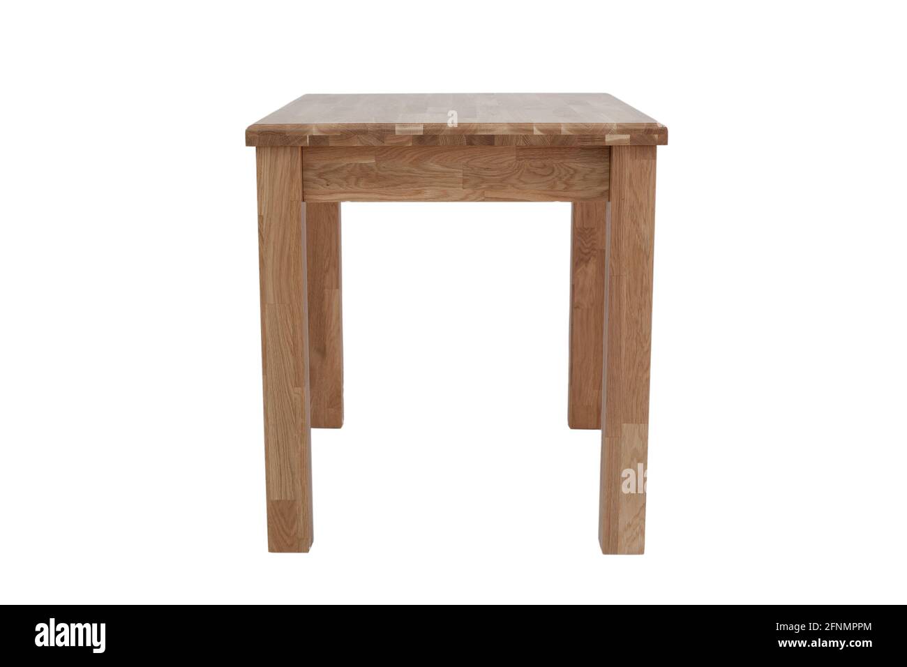 Wooden table made of oak furniture board. Kitchen dining table, on