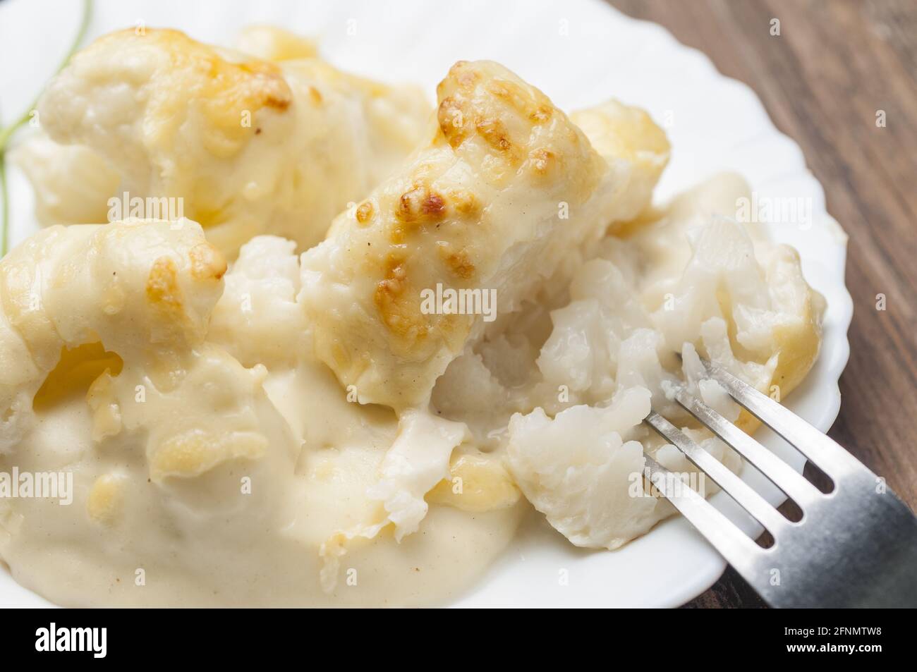 Cauliflower with bechamel gratin baked Stock Photo Alamy