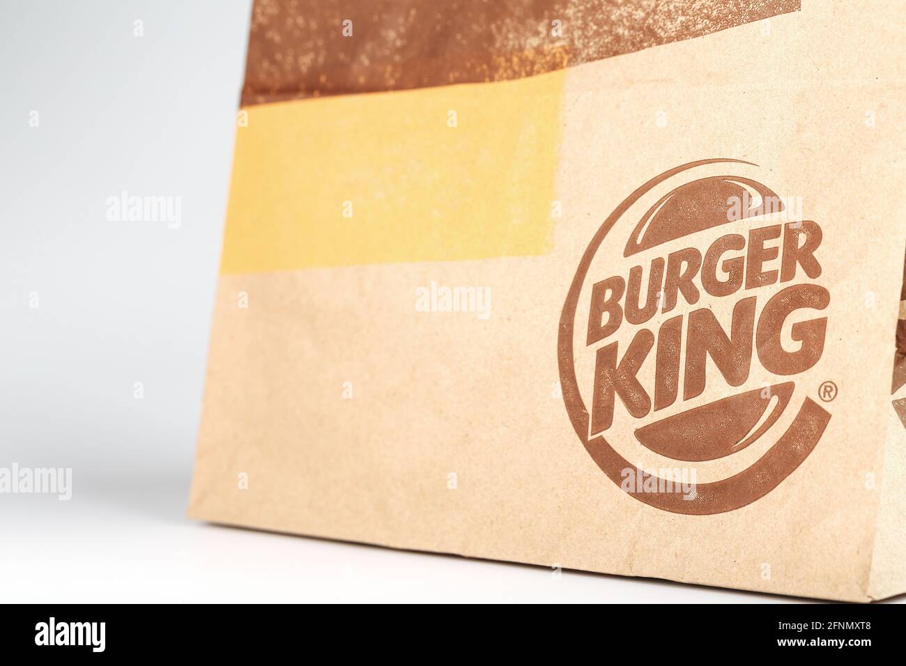Russia, Moscow - May 17, 2021: Paper packaging with an order from Burger King on a white background. Burger King is a global fast food hamburger chain Stock Photo