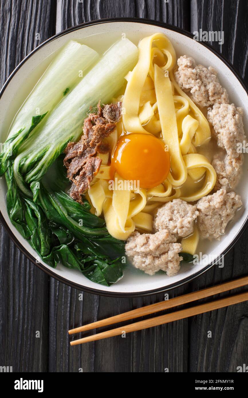 Ban Mian Minced Pork Noodle Soup Handmade closeup in the bowl on the ...