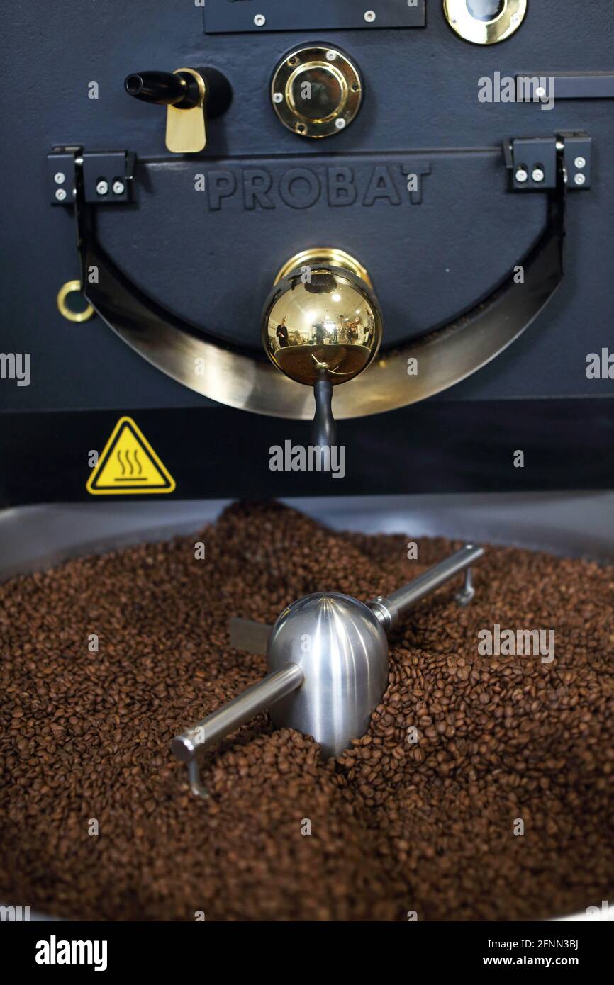 Close-up of coffee beans in roaster Stock Photo