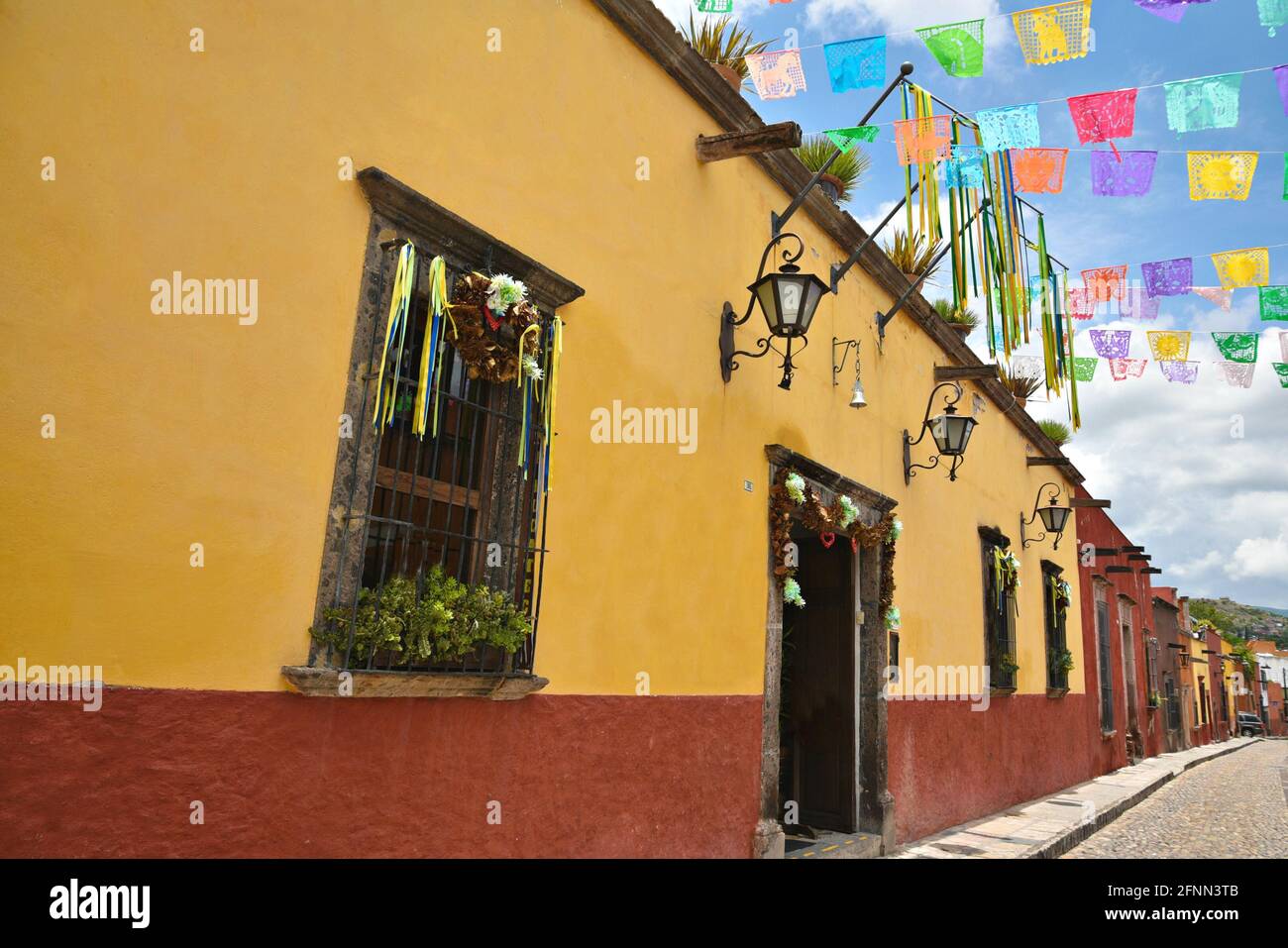 Typical elegant ochre façades of the Spanish Colonial era architecture ...